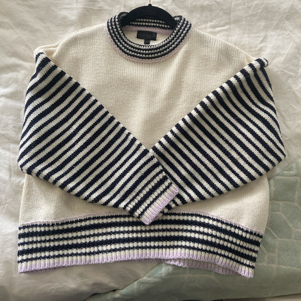 Striped sleeve cream cropped oversized sweater with lavender stitch detail